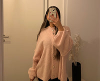 Lange Oversize Strickjacke mit Knöpfen | Aprikose/ Rosa