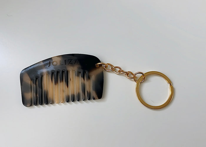 Mini Kammanhänger aus Acetat | Leo