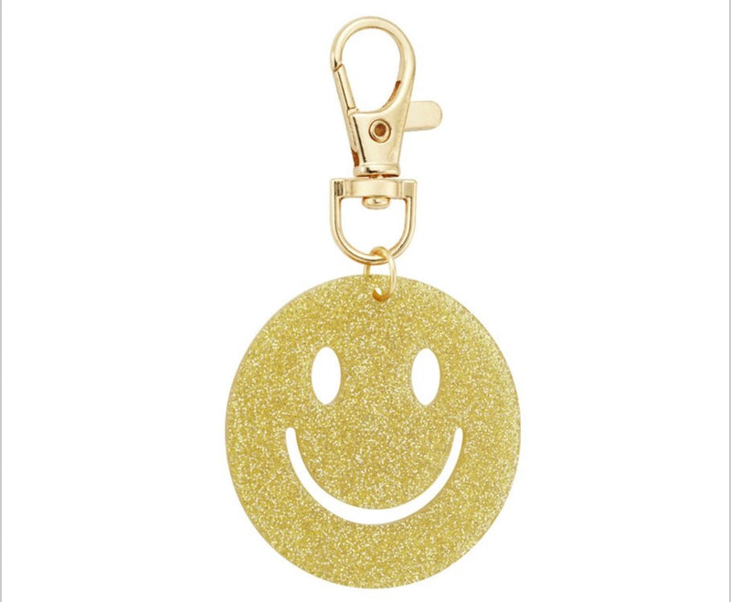 Glitzernder Smiley-Anhänger in gold mit Karabiner