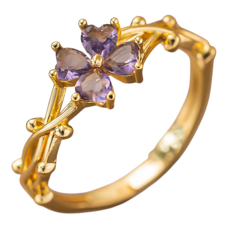 Verstellbarer Ring -  Vergoldeter Blütenring mit violettem Zirkonia
